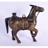 A 17TH/18TH CENTURY INDIAN BRONZE FIGURE OF A HORSE modelled with engraved motifs. 21 cm x 18 cm.