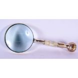 A CONTINENTAL SILVER PLATED MOTHER OF PEARL MAGNIFYING GLASS. 25 cm x 10 cm.
