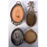 THREE EARLY 20TH FRENCH EMPIRE GILT METAL PHOTOGRAPH FRAMES together with a silver frame. Largest 13