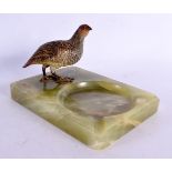 A 19TH CENTURY AUSTRIAN COLD PAINTED BRONZE AND ONYX ASKTRAY modelled with a game bird. 18 cm x 10 c