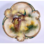 Early 20th c. Hadley Worcester shaped plate painted with two peacocks in landscape 22cm Diameter