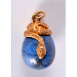 A CONTINENTAL SILVER GILT LAPIZ LAZULI SNAKE PENDANT. 13.8 grams. 3 cm x 2 cm.