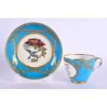 Mid 19th century Minton cup and saucer painted with birds in landscape surrounded by a turquoise and