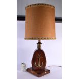 A CHARMING LARGE EARLY 20TH CENTURY MARITIME LAMP overlaid with a brass anchor. 80 cm high.