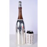 A CHAMPAGNE SILVER PLATED BOTTLE COCKTAIL SHAKER. 37 cm high.