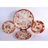 A LARGE 19TH CENTURY JAPANESE MEIJI PERIOD KUTANI DISH together with three plates. Largest 38 cm dia