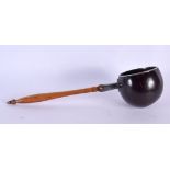 A LOVELY GEORGE III TREEN AND COCONUT SERVING LADLE probably silver mounted. 37 cm long.