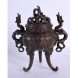 A CHINESE QING DYNASTY BRONZE CENSER AND COVER bearing Qianlong marks to base, formed with stylised
