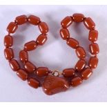 A CHERRY AMBER TYPE NECKLACE. 42 grams. 46 cm long.