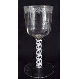 AN ANTIQUE WINE GLASS. 16 cm high.