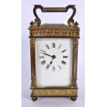 AN ANTIQUE FRENCH GLASS CARRIAGE CLOCK. 15 cm high.