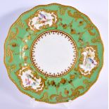 Royal Crown Derby plate painted with exotic birds in gilt cartouches with raise paste tooled gilding