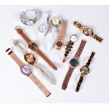 A collection of ladies fashion watches, GP, Anne Clein, Gamages,Pulsar etc (11).
