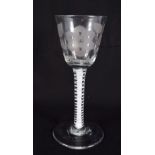 AN ANTIQUE WINE GLASS. 15 cm high.