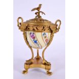 A 19TH CENTURY FRENCH ORMOLU AND PORCELAIN INKWELL painted with flowers. 15 cm x 7 cm.