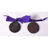 TWO UNUSUAL ANTIQUE BOMBAY RELIEF FUND MEDALLIONS. 29 grams. 3.25 cm wide. (2