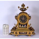 A LARGE 19TH CENTURY FRENCH PORCELAIN AND BRONZE MANTEL CLOCK painted with figures in landscapes. 36