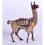 A VINTAGE WHITE METAL FIGURE OF AN ALPACCA. 70 grams. 6.5 cm x 5 cm.