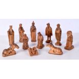 A collection of carved wooden religious Nativity figures 15 cm (11).