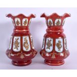 A PAIR OF ANTIQUE BOHEMIAN GLASS VASES. 12 cm high.