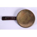 A VERY UNUSUAL EARLY CHINESE BRONZE BRUSH WASHER Ming/Qing, formed as a small mirror. 9.5 cm x 5.25
