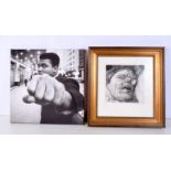 A framed print of Mohammed Ali together with a limited edition print "Sleeping head" by Dennis Loves