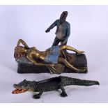 A COLD PAINTED EROTIC FIGURAL GROUP together with a cold painted bronze crocodile. Largest 18 cm x 1