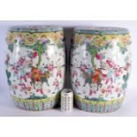 A LARGE PAIR OF CHINESE REPUBLICAN PERIOD FAMILLE ROSE GARDEN SEATS painted with figures. 45 cm x 24