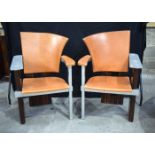 An unusual pair of French 1970's Chrome and leather chairs with Zebra wood back supports and swivel
