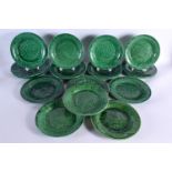 A SET OF EIGHTEEN ANTIQUE GREEN GLAZED MAJOLICA CABBAGE LEAF DISHES. 22 cm diameter. (18)