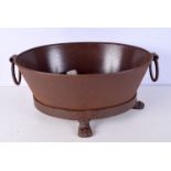 A large cast iron oval garden planter 24 x 58 cm.