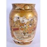A 19TH CENTURY JAPANESE MEIJI PERIOD SATSUMA VASE painted with figures in landscapes. 18 cm x 10 cm.