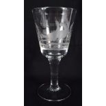 AN ANTIQUE WINE GLASS. 20 cm high.