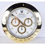 A Contemporary Rolex dealership style wall clock 34 cm.