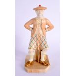 A ROYAL WORCESTER FIGURE OF A SCOTSMAN. 15 cm high.