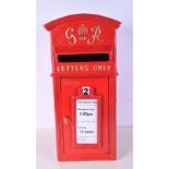 A cast iron contemporary mail box 58 x 36 x 28 cm.