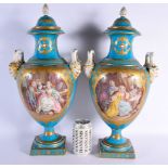 A GOOD LARGE PAIR OF 19TH CENTURY FRENCH SEVRES PORCELAIN VASES AND COVERS painted with birds and fi