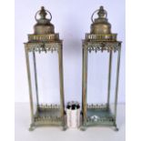 A pair of large metal and glass square sided lanterns 54cm (2)