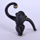 A RETRO AUSTRIAN BRONZE FIGURE OF A MONKEY. 8 cm x 6.5 cm.