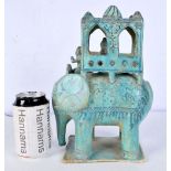 A Kashan style Turquoise glazed pottery model of and Elephant 20th Century 27 x 18 cm.