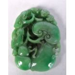 A Chinese carved jade boulder 9 x 7 cm.
