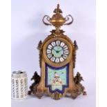 A 19TH CENTURY FRENCH BRONZE AND PORCELAIN MANTEL CLOCK painted with a Chinese musician. 40 cm x 15