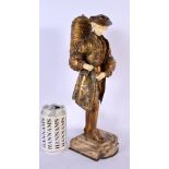 A LARGE ART NOUVEAU FRENCH BRONZE AND IVORY FIGURE OF A MALE modelled holding a cup. 35 cm high. Ivo