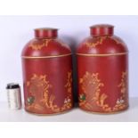 A pair of red Chinese design Tole ware style tea tins 36 cm.