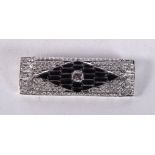 AN ART DECO PLATINUM DIAMOND AND ENAMEL BROOCH. 9.1 grams. 4 cm x 1.25 cm.