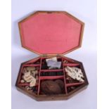 AN INTERESTING VICTORIAN COUNTRY HOUSE SPECIMAN BOX containing shells, wax seals etc. 34 cm x 22 cm.