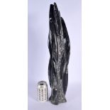 A LARGE STYLISH FOSSILISED STONE SCULPTURE. 54 cm high.