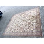 A large Oriental rug 270 x 227 cm