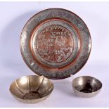 TWO VINTAGE CONTINENTAL WHITE METAL BOWLS together with an Islamic dish. Largest 18 cm wide. (3)