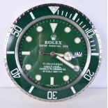 A Contemporary Rolex dealership style wall clock 34 cm.